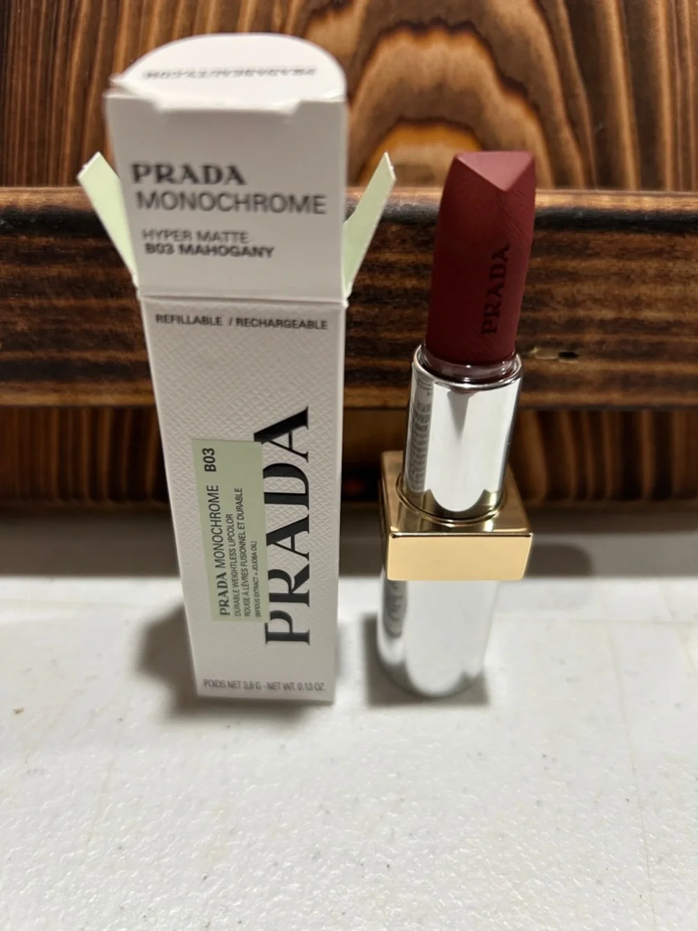 Prada Monochrome Hyper Matte Lipstick B03 Mahogany - Deep Mahogany Red